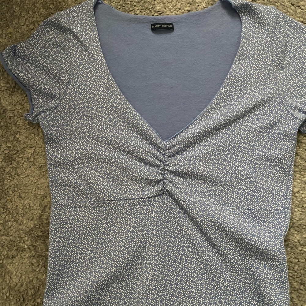 blue cinched shirt with flowers